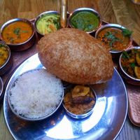 This is a signature dish, the main course of a thali. Vegan & delicious! at Herb Restaurant in Leicester