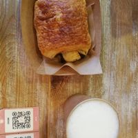 Pain au chocolat and Cappuccino (with oat milk) at Edgy Veggy in Sofia