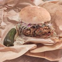 BBQ Tempeh Burger in a pickle (about to get eaten) at Edgy Veggy in Sofia