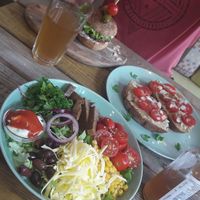 Taco salad, hummus bread and quinoa burger at Edgy Veggy in Sofia