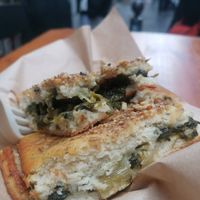 Stuffed foccicia with mushroom, greens, raisins & nuts 👌🇮🇹 at Oven  in Naples