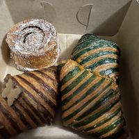 Left Top - Morning bun, Left bottom - Nocciolata croissant, Right top - blueberry cheesecake croissant, Right bottom- apricot and cheese croissant   at L'Artisane Creative Bakery in Coral Gables