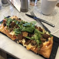 Vegan mushroom flatbread with Italian vegan sausage OMG OMG    at L'Artisane Creative Bakery in Coral Gables