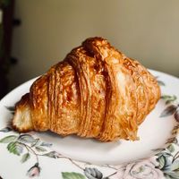 I mean, just look at this thing!!! 😍😍 Plain croissant , delivered fresh to my home from L’Artisane Bakery   at L'Artisane Creative Bakery in Coral Gables