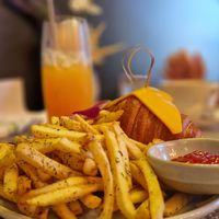 Quiche, croissant monsieur and almond croissant. Mexican Sunrise Cocktail at L'Artisane Creative Bakery in Coral Gables