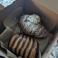 Pain au chocolat and almond croissant at L'Artisane Creative Bakery in Coral Gables
