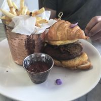 Breakfast sandwich on a croissant at L'Artisane Creative Bakery in Coral Gables