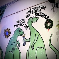 Quirky illustration 🦖  at Falafel Penang in Penang