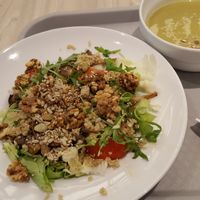 Cream soup with green peas and salad with quinoa and caramelized walnuts at Salateira - Dana Mall in Minsk