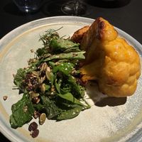 Roasted Cauliflower:
Cauliflower steak, tahini, coconut yoghurt, sumac, dukkha, seeds, parsley, coriander, & mint.   at Old Wharf at MACq 01 Hotel in Hobart