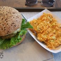 "Le Yellow" burger (with a curry sauce and a slice of pineapple) with a side of coleslaw at The Wild Note in Bordeaux