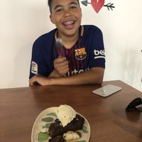 Vegan brownie with vanilla ice cream at Ta'consciente in Playa Del Carmen