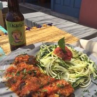 Buckwheat „meatballs“ in tomato sauce (???) goes well with lagarta beer ?  at Grow Café in Tarifa