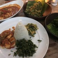 Rica rica tofu (left, back) and Urap Pakis (front right) at Batan Waru in Gianyar