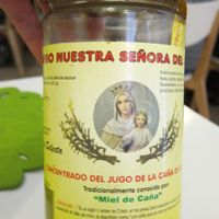 The cook came out to show me the vegan 'honey.' at Loving Hut in Malaga