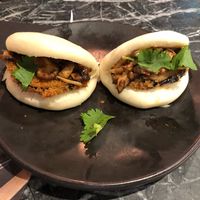 Soft bun with mixed mushroom, aubergine and coriander  at LHR - Wagamama - T5 in West London