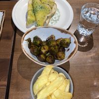 Triple cooked chips, vegan garlic bread and maple cooked Brussel sprouts!   at Hillhead Bookclub in Glasgow