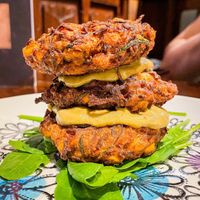 sweetcorn and chickpea fritters with smashed avocado and spinach at Hillhead Bookclub in Glasgow