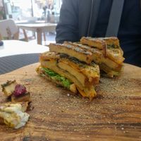 Sizzling Skillet Tofu Sandwich = Best Sandwich we have had! (Tops even Smith and Deli & The Shack). at Back2Nature Vegan Cafe in Brighton