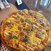 Tandoori chicken pizza at Back2Nature Vegan Cafe in Brighton