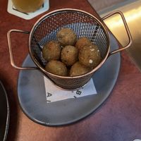 Fried olives with a feta cream inside.  at Alibi in Sydney