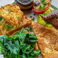 Watch your dentures on those hash browns, but at least you get an onion ring as a consolation.  at Zest Ubud in Ubud