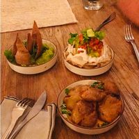 Loaded taro chips, crispy crushed baby potatoes, and crushed avocado salsa at Zest Ubud in Ubud