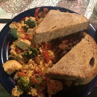 Yummy tofu scramble with vegan cashew sauce and home fries! Beware there is no vegan butter so I had to have this toast replaced with dry toast!  at The Friendly Toast in Portsmouth