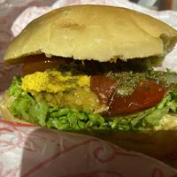 That's a tomato pesto burger.  at Desvio Bar in Florianopolis