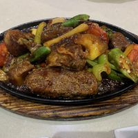 Sizzling fish hot plate at Loving Hut in Cabramatta