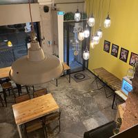 Two floor restaurant, nice interior and chairs.   at Hank Cuisine Végétale in Lyon