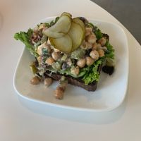 Open faced chickpea salad sandwich  at Carina's Bakery in Beaverton