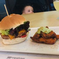 The super tasty burger and sweet potato chips. at Bon Lloc in Mallorca