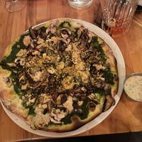 Vegan fungi pizza with vegan ranch.  at Atomica in Kingston
