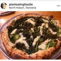 Kale and broccoli Woodfire vegan pizza! Yummmm! Lots of options to choose from  at Room For A Pony in North Hobart