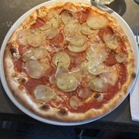 Pizza 108 (salcciciana) with vegan cheese, vegan salami, potatoes (this seems to be a danish thing?) and rosemary  at Café Piccolina in Aarhus