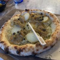 Confit potato and caramelised onion pizzette  at Salt House Bacaro in Liverpool