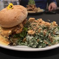 Chipotle Chicken burger with Kale Caesar salad  at The Vegan Hippie Chick in Welland