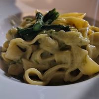 Strangozzi con crema di asparagi e pecorino at Osteria La Loggetta in Paciano