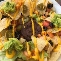 Fully loaded vegan nachos at Martha's Cafe Belize in Belize City