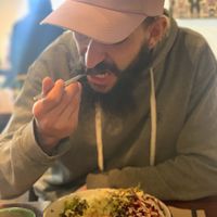 Matt testing the food  at Big Fig in Wanaka