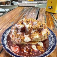 Berry pancakes. Divine. Lots of toppings  at Karibu Cafe in Utrecht