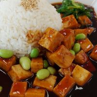 Tofu with a sweet sauce, edamame and rice. at Cafe im Kunstmuseum in Vaduz