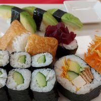 Rice and Avocado, a giant rice ball, more rice and Avocado, rice with a couple of beet peices o  TOP, and only one good mixed sushi piece. All this for 28 CHF, which is $49 CAD. at Cafe im Kunstmuseum in Vaduz