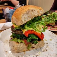 Vegan breakfast burger with vegan cheese, mushroom, roast pepper, crispy kale, smashed peas etc. Nice and big! at The Pig and Pastry in York