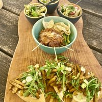 Second round high tea: pasta pesto salad, gado gado chicken and flatbread with shoarma  at Black & White Kafe in Breda