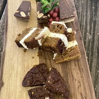 Third round high tea: strawberry cheesecake, date-pinda bars, carrotcake and chocolate cookies  at Black & White Kafe in Breda