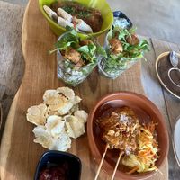 Second round high tea: aubergine stew, falafel salad and chicken satay  at Black & White Kafe in Breda