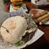 Döner and (vegan) cheese spring rolls in the background   at Ping Pong Parck in Amsterdam