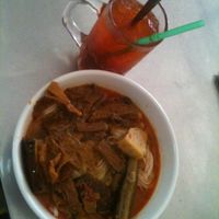 red Curry with traditional Khmer noodles and Lemon ice tea at Ahaa Boer Vegetarian Food in Battambang